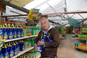 Comedian-and-TV-Host-Michael-Barrymore-working-part-time-in-Garden-Center-
